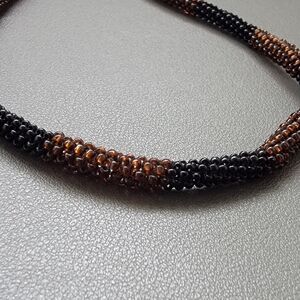 Artisanal Black & Amber Glass Seed Bead Necklace – Handwoven Knot Design